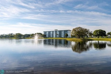 EXPERIENCE DRAMATIC WATER VIEWS FROM THIS CORNER TURNKEY UNIT! on Palm-Aire Country Club and Resort - Palms in Florida - for sale on GolfHomes.com, golf home, golf lot