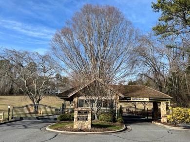 This beautifully wooded .72 acre lot is located in the gated on Chatuge Shores Golf Course in North Carolina - for sale on GolfHomes.com, golf home, golf lot