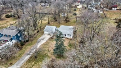 Welcome to your dream home! This charming 3-bed, 2-bath retreat on Drumm Farm Golf Course in Missouri - for sale on GolfHomes.com, golf home, golf lot