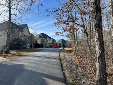 This beautifully wooded .72 acre lot is located in the gated on Chatuge Shores Golf Course in North Carolina - for sale on GolfHomes.com, golf home, golf lot