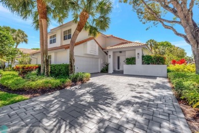 Looking for a townhome you can move right in or rent out right on Broken Sound Golf and Club  in Florida - for sale on GolfHomes.com, golf home, golf lot