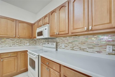 Welcome to this well-maintained home nestled in the sought-after on The Groves Golf and Country Club in Florida - for sale on GolfHomes.com, golf home, golf lot