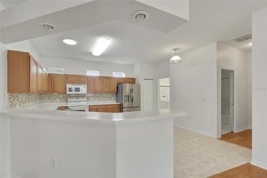 Welcome to this well-maintained home nestled in the sought-after on The Groves Golf and Country Club in Florida - for sale on GolfHomes.com, golf home, golf lot