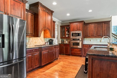 Luxurious Full-Brick Home with Stunning Golf Course Views in on Eagles Landing Country Club in Georgia - for sale on GolfHomes.com, golf home, golf lot