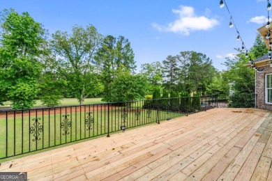 Luxurious Full-Brick Home with Stunning Golf Course Views in on Eagles Landing Country Club in Georgia - for sale on GolfHomes.com, golf home, golf lot