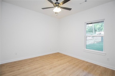 $5,000 Buyer Incentive! Come enjoy Bella Vista and all it has to on Bella Vista - Metfield Golf Complex and Country Club in Arkansas - for sale on GolfHomes.com, golf home, golf lot