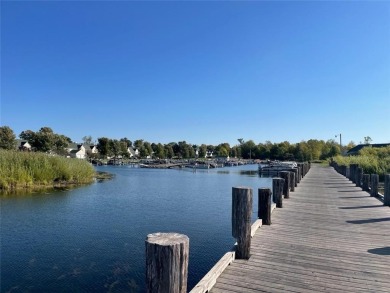 Location is what will bring you to this spacious 4 bedroom 3 on Izatys Golf and Yacht Club in Minnesota - for sale on GolfHomes.com, golf home, golf lot