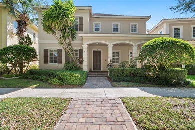 Versatile 4-bedroom, 3-bath Abacoa residence with sparkling LAKE on The Club At Admirals Cove Golf Village in Florida - for sale on GolfHomes.com, golf home, golf lot