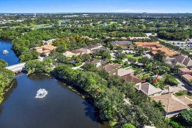 Versatile 4-bedroom, 3-bath Abacoa residence with sparkling LAKE on The Club At Admirals Cove Golf Village in Florida - for sale on GolfHomes.com, golf home, golf lot
