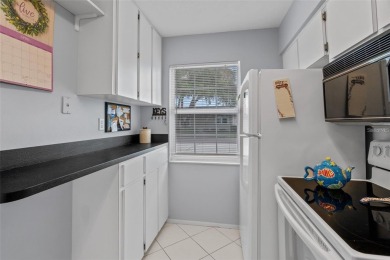 STUNNING VIEW! Perfect location to enjoy this 2 bed 2 bath on Seven Springs Golf and Country Club in Florida - for sale on GolfHomes.com, golf home, golf lot