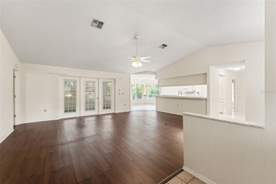 Welcome to this well maintained 2-bedroom, 2-bathroom on Oak Hills Country Club in Florida - for sale on GolfHomes.com, golf home, golf lot