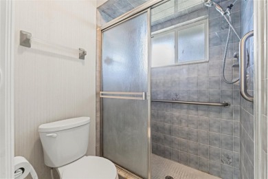 Welcome to this well maintained 2-bedroom, 2-bathroom on Oak Hills Country Club in Florida - for sale on GolfHomes.com, golf home, golf lot