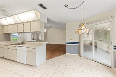 Welcome to this well maintained 2-bedroom, 2-bathroom on Oak Hills Country Club in Florida - for sale on GolfHomes.com, golf home, golf lot