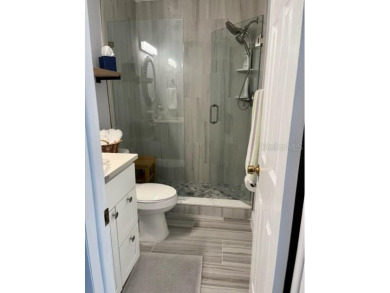 STUNNING VIEW! Perfect location to enjoy this 2 bed 2 bath on Seven Springs Golf and Country Club in Florida - for sale on GolfHomes.com, golf home, golf lot