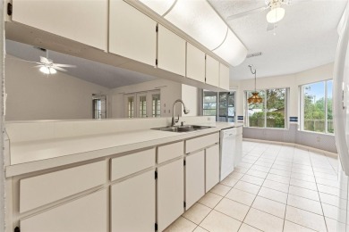 Welcome to this well maintained 2-bedroom, 2-bathroom on Oak Hills Country Club in Florida - for sale on GolfHomes.com, golf home, golf lot