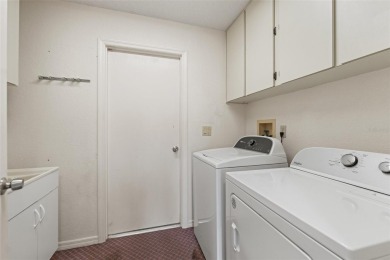 Welcome to this well maintained 2-bedroom, 2-bathroom on Oak Hills Country Club in Florida - for sale on GolfHomes.com, golf home, golf lot