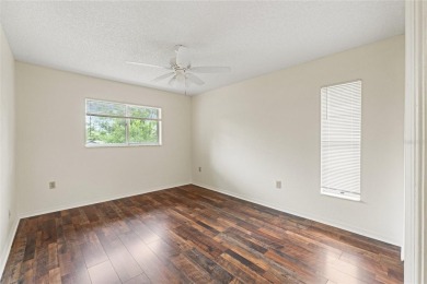 Welcome to this well maintained 2-bedroom, 2-bathroom on Oak Hills Country Club in Florida - for sale on GolfHomes.com, golf home, golf lot