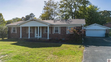 Two bedroom, 1.5-bath brick home offering 1,680 sq ft of on Calvert City Golf and Country Club in Kentucky - for sale on GolfHomes.com, golf home, golf lot