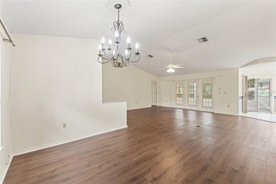 Welcome to this well maintained 2-bedroom, 2-bathroom on Oak Hills Country Club in Florida - for sale on GolfHomes.com, golf home, golf lot