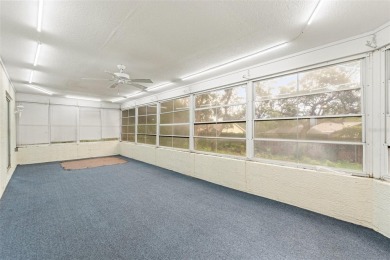 Welcome to this well maintained 2-bedroom, 2-bathroom on Oak Hills Country Club in Florida - for sale on GolfHomes.com, golf home, golf lot