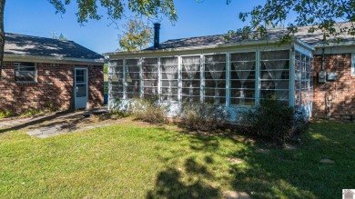 Two bedroom, 1.5-bath brick home offering 1,680 sq ft of on Calvert City Golf and Country Club in Kentucky - for sale on GolfHomes.com, golf home, golf lot