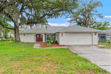 Welcome to this well maintained 2-bedroom, 2-bathroom on Oak Hills Country Club in Florida - for sale on GolfHomes.com, golf home, golf lot