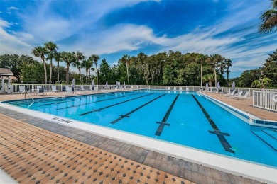 STUNNING VIEW! Perfect location to enjoy this 2 bed 2 bath on Seven Springs Golf and Country Club in Florida - for sale on GolfHomes.com, golf home, golf lot