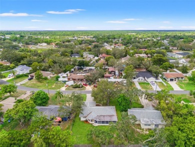 Welcome to this well maintained 2-bedroom, 2-bathroom on Oak Hills Country Club in Florida - for sale on GolfHomes.com, golf home, golf lot