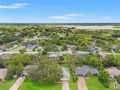 Welcome to this well maintained 2-bedroom, 2-bathroom on Oak Hills Country Club in Florida - for sale on GolfHomes.com, golf home, golf lot