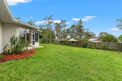 Welcome to this well maintained 2-bedroom, 2-bathroom on Oak Hills Country Club in Florida - for sale on GolfHomes.com, golf home, golf lot