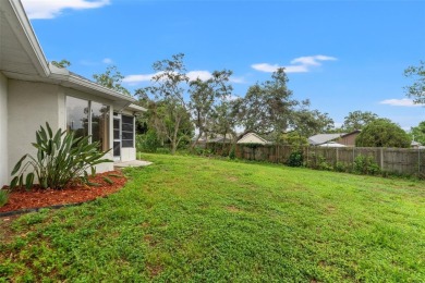 Welcome to this well maintained 2-bedroom, 2-bathroom on Oak Hills Country Club in Florida - for sale on GolfHomes.com, golf home, golf lot
