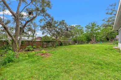 Welcome to this well maintained 2-bedroom, 2-bathroom on Oak Hills Country Club in Florida - for sale on GolfHomes.com, golf home, golf lot