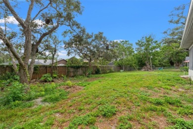 Welcome to this well maintained 2-bedroom, 2-bathroom on Oak Hills Country Club in Florida - for sale on GolfHomes.com, golf home, golf lot
