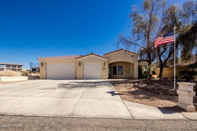 Situated in a peaceful cul-de-sac, this stunning 3-bedroom on London Bridge Golf Course in Arizona - for sale on GolfHomes.com, golf home, golf lot