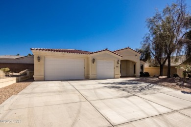 Situated in a peaceful cul-de-sac, this stunning 3-bedroom on London Bridge Golf Course in Arizona - for sale on GolfHomes.com, golf home, golf lot