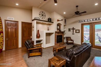 Situated in a peaceful cul-de-sac, this stunning 3-bedroom on London Bridge Golf Course in Arizona - for sale on GolfHomes.com, golf home, golf lot