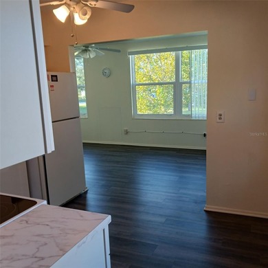 Two bedroom/two bath condo on the second floor across a on On Top Of The World Golf Course in Florida - for sale on GolfHomes.com, golf home, golf lot