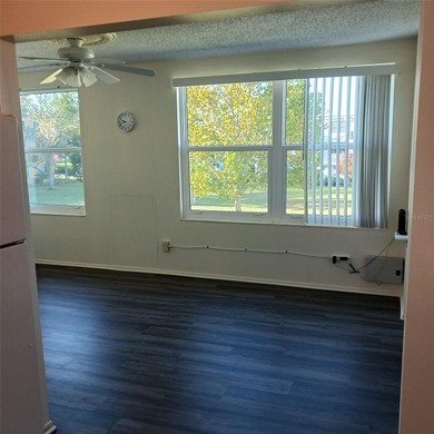 Two bedroom/two bath condo on the second floor across a on On Top Of The World Golf Course in Florida - for sale on GolfHomes.com, golf home, golf lot