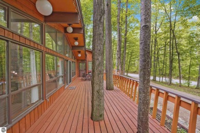 Anchor your Northern Michigan adventures at this architecturally on The Chief Golf Course in Michigan - for sale on GolfHomes.com, golf home, golf lot