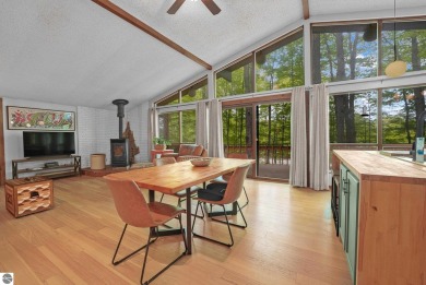 Anchor your Northern Michigan adventures at this architecturally on The Chief Golf Course in Michigan - for sale on GolfHomes.com, golf home, golf lot