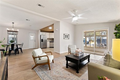 A clean, bright, and inviting manufactured home offering on Lakes of Lady Lake Golf Course in Florida - for sale on GolfHomes.com, golf home, golf lot