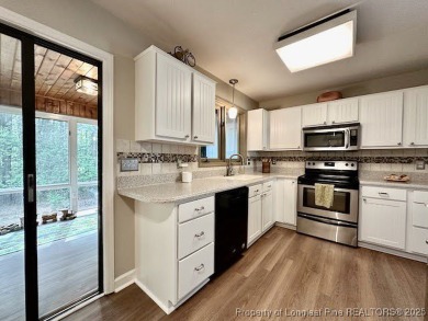 Charming Nantucket-style 3BR/2BA home in the gated lake & golf on Carolina Lakes Country Club in North Carolina - for sale on GolfHomes.com, golf home, golf lot