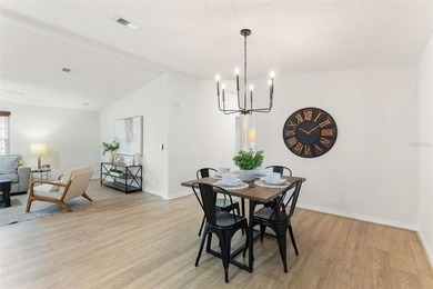 A clean, bright, and inviting manufactured home offering on Lakes of Lady Lake Golf Course in Florida - for sale on GolfHomes.com, golf home, golf lot