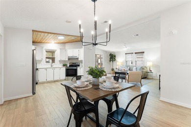 A clean, bright, and inviting manufactured home offering on Lakes of Lady Lake Golf Course in Florida - for sale on GolfHomes.com, golf home, golf lot