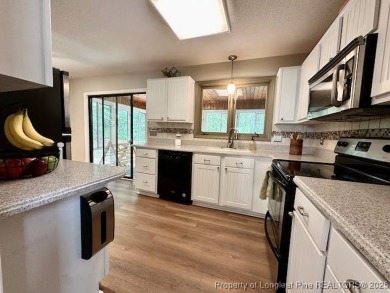 Charming Nantucket-style 3BR/2BA home in the gated lake & golf on Carolina Lakes Country Club in North Carolina - for sale on GolfHomes.com, golf home, golf lot