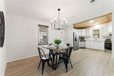 A clean, bright, and inviting manufactured home offering on Lakes of Lady Lake Golf Course in Florida - for sale on GolfHomes.com, golf home, golf lot