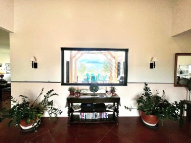Situated on 6.77 acres spanning three independent parcels (two on Taos Country Club in New Mexico - for sale on GolfHomes.com, golf home, golf lot