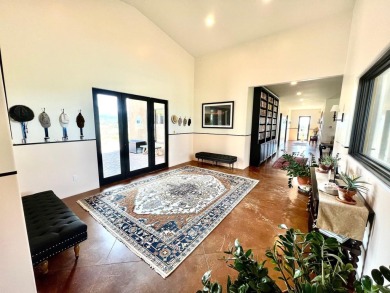 Situated on 6.77 acres spanning three independent parcels (two on Taos Country Club in New Mexico - for sale on GolfHomes.com, golf home, golf lot