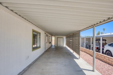 Charming 2-bedroom, 2-bath manufactured home in Palm Desert's on Portola Country Club in California - for sale on GolfHomes.com, golf home, golf lot