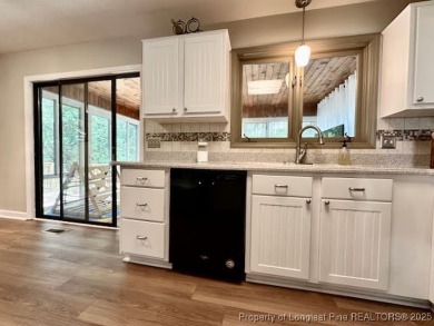 Charming Nantucket-style 3BR/2BA home in the gated lake & golf on Carolina Lakes Country Club in North Carolina - for sale on GolfHomes.com, golf home, golf lot
